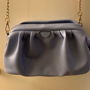Blue crossbody bag with chain strap